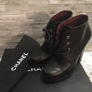 CHANEL lace up black booties